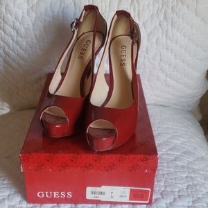 Red patent peep toe heels